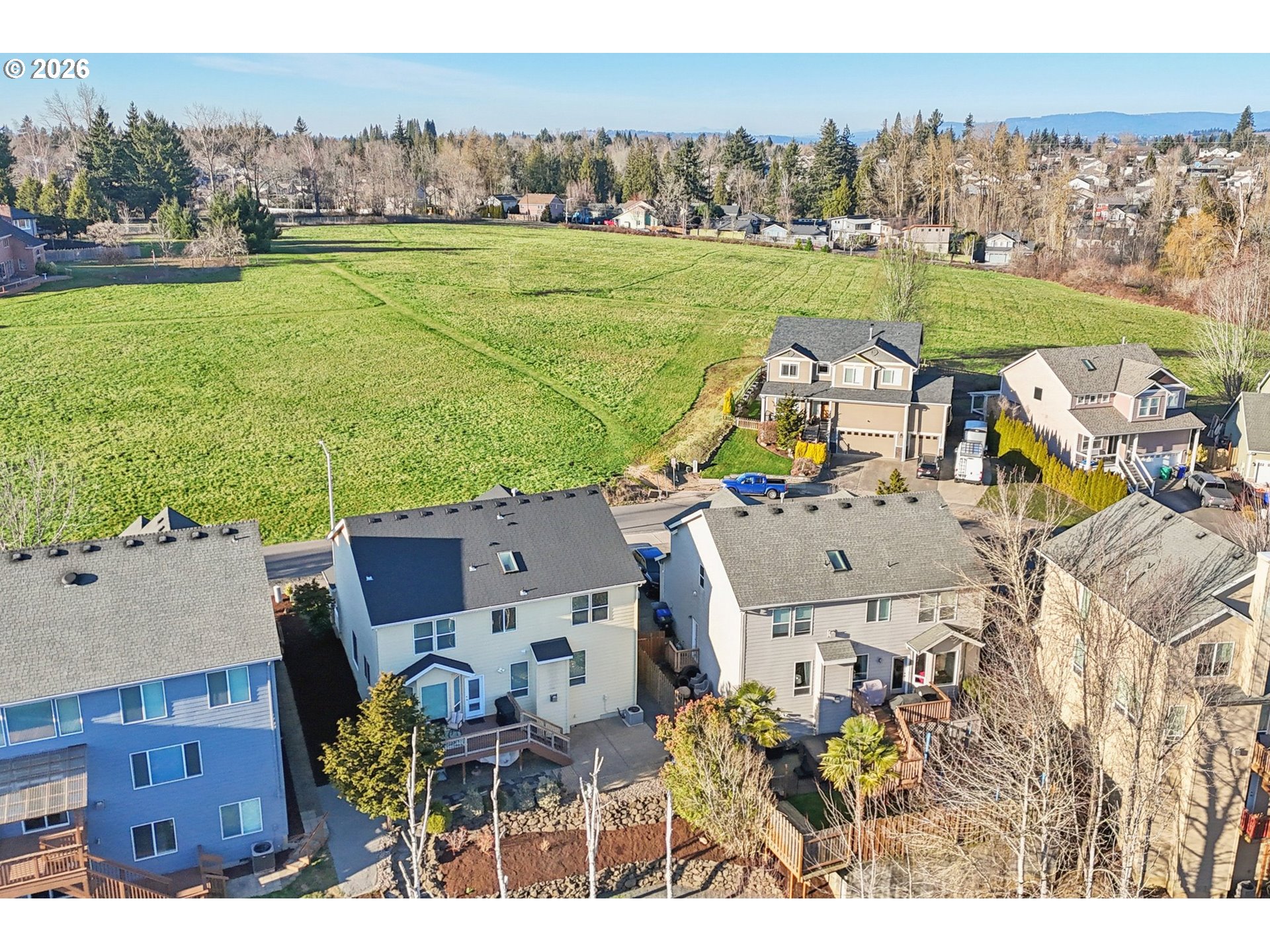 2404 Southeast Jasmine Way Gresham, OR 97080 - Photo 42 of 48 an aerial view of a house with big yard