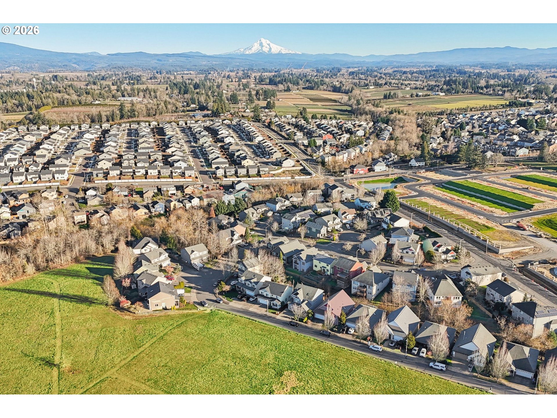 2404 Southeast Jasmine Way Gresham, OR 97080 - Photo 48 of 48 an aerial view of residential houses with outdoor space