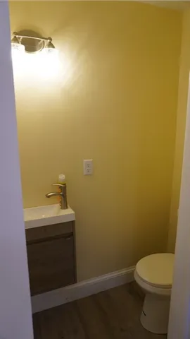 a bathroom with a sink and toilet