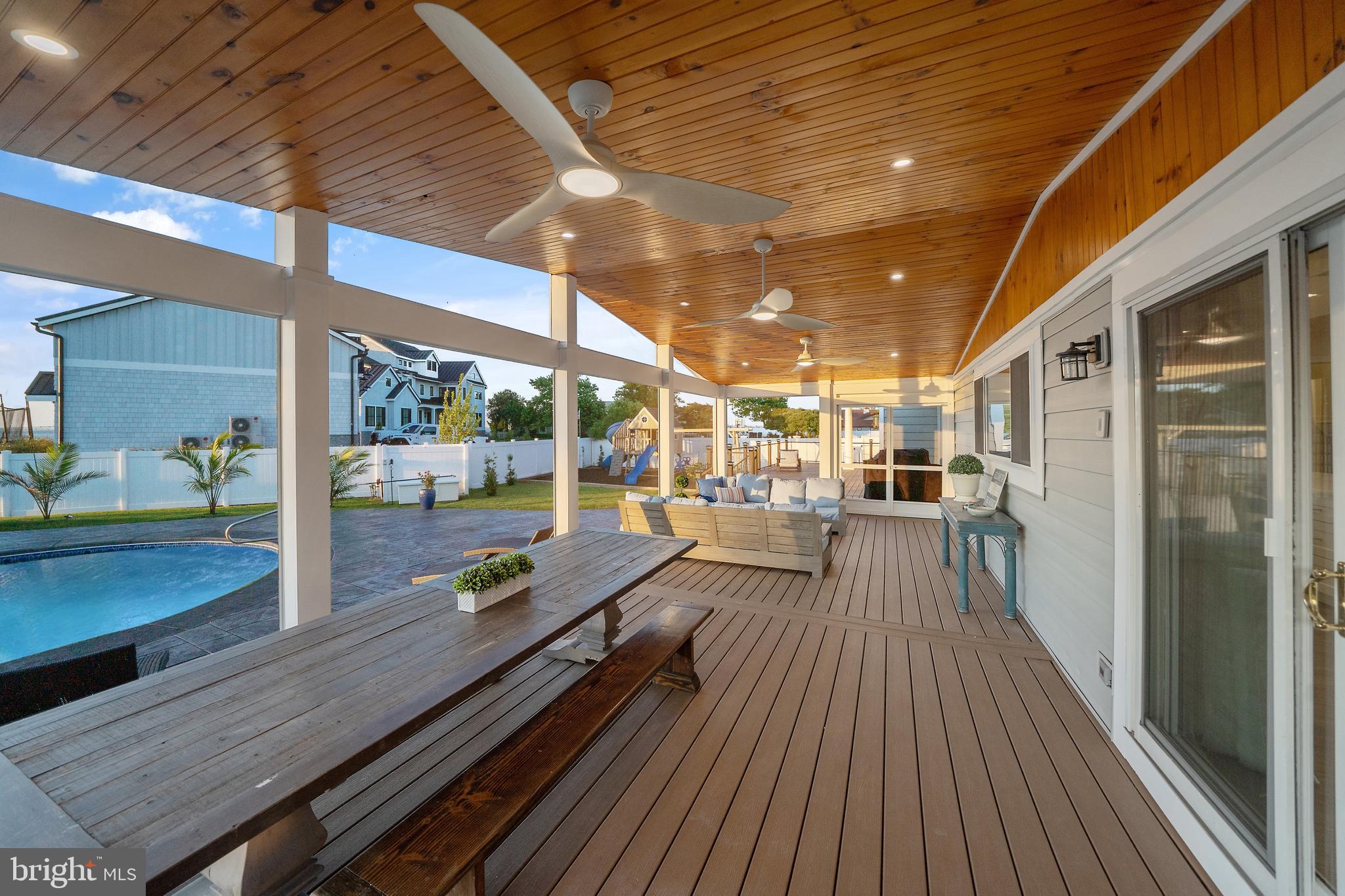 13023 North Shore Road Ocean City, MD 21842 - Photo 15 of 62 Screen Porch off Kitchen