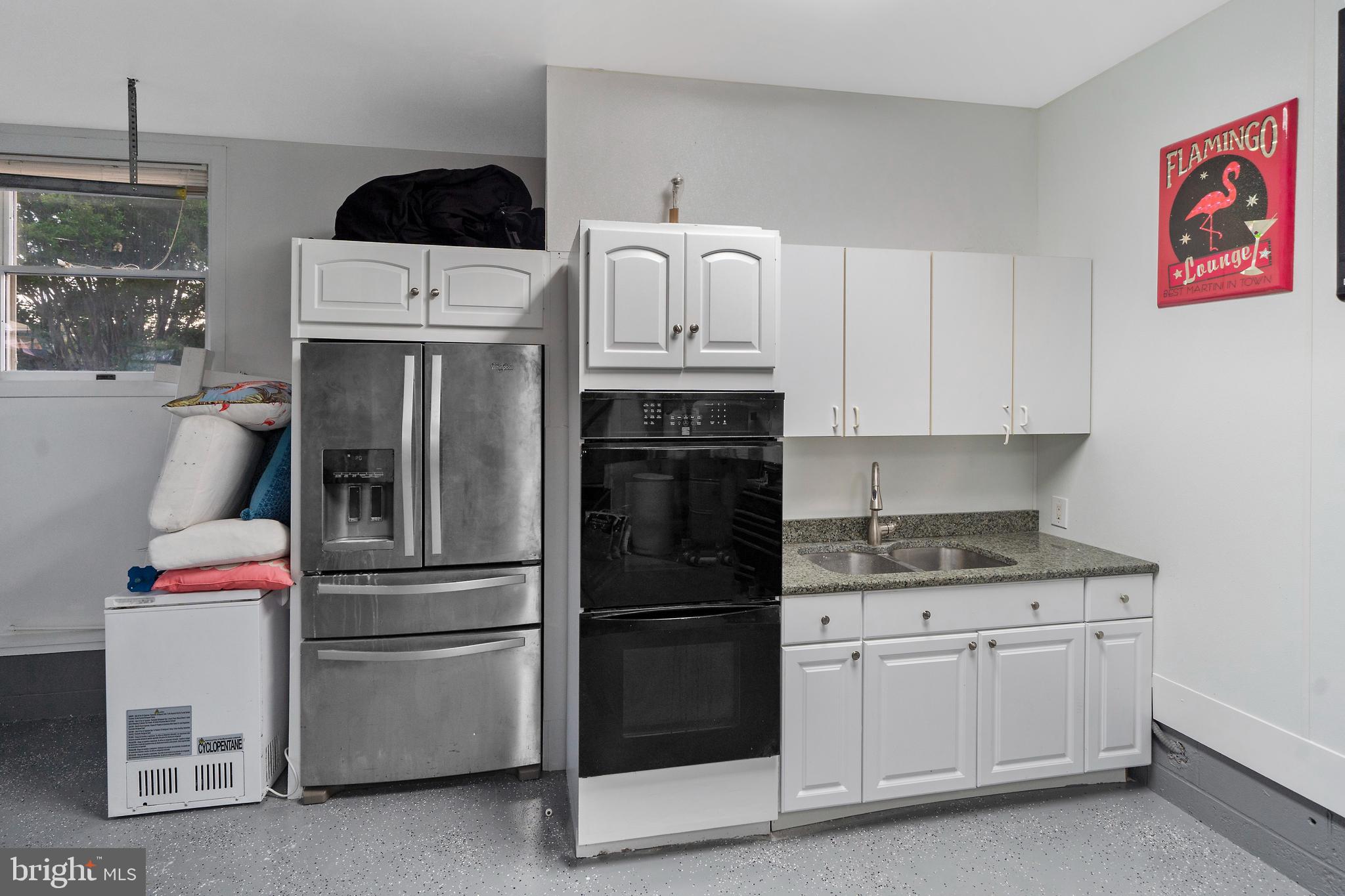 13023 North Shore Road Ocean City, MD 21842 - Photo 52 of 62 2 Car Garage with Extra Kitchen