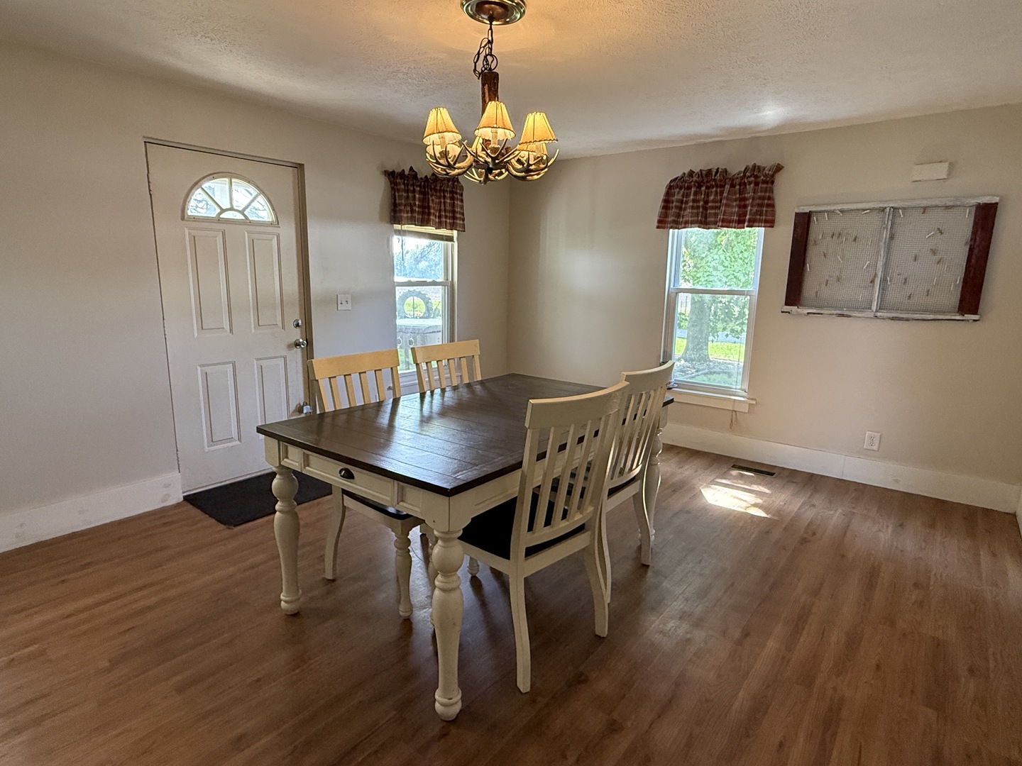 22503 2800th Road North Odell, IL 60460 - Photo 6 of 30 a view of a dining room with furniture and chandelier