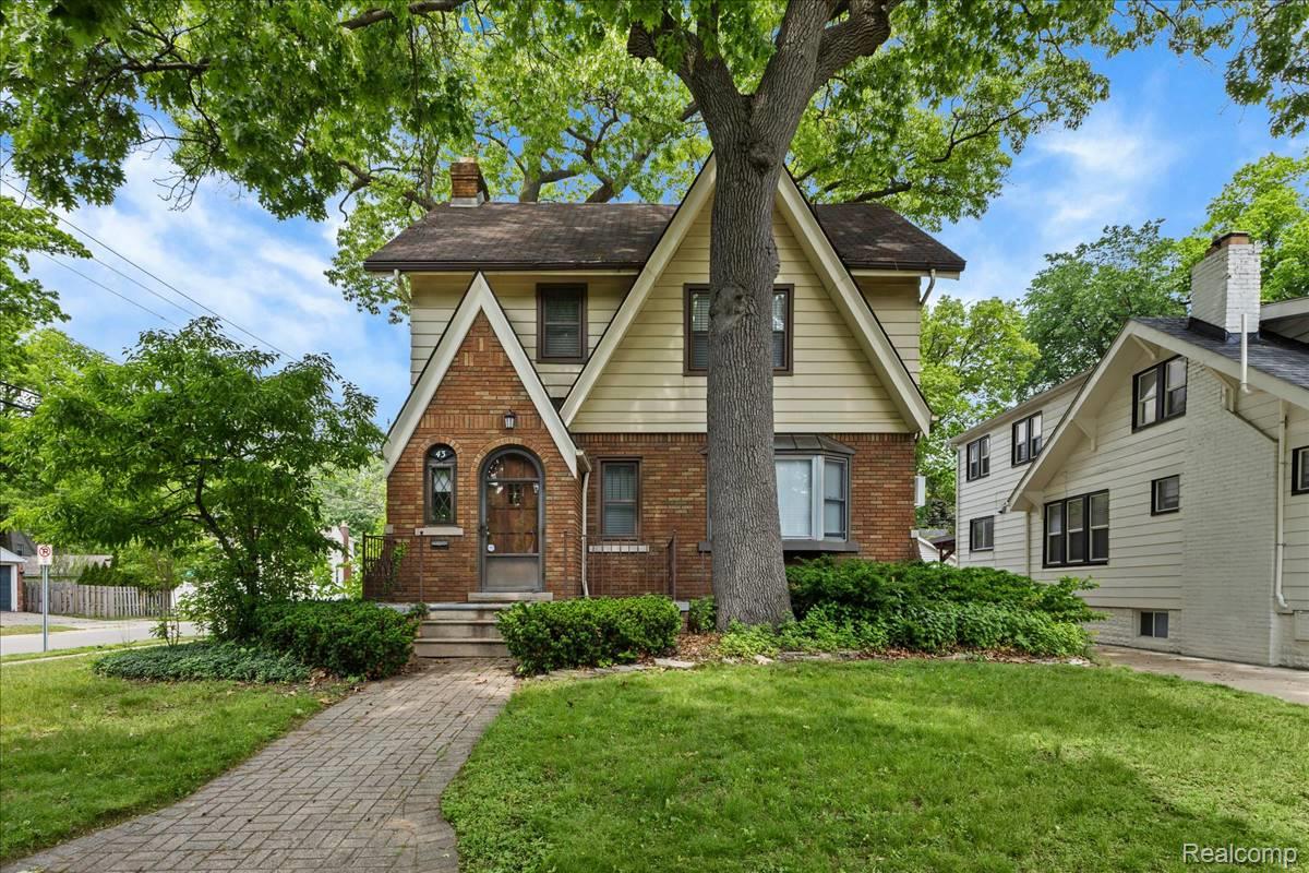 43 Wellesley Drive Pleasant Ridge, MI 48069 - Photo 42 of 52 Brick and siding exterior with a prominent gabled roofline