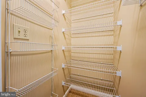 a view of a door and wooden floor