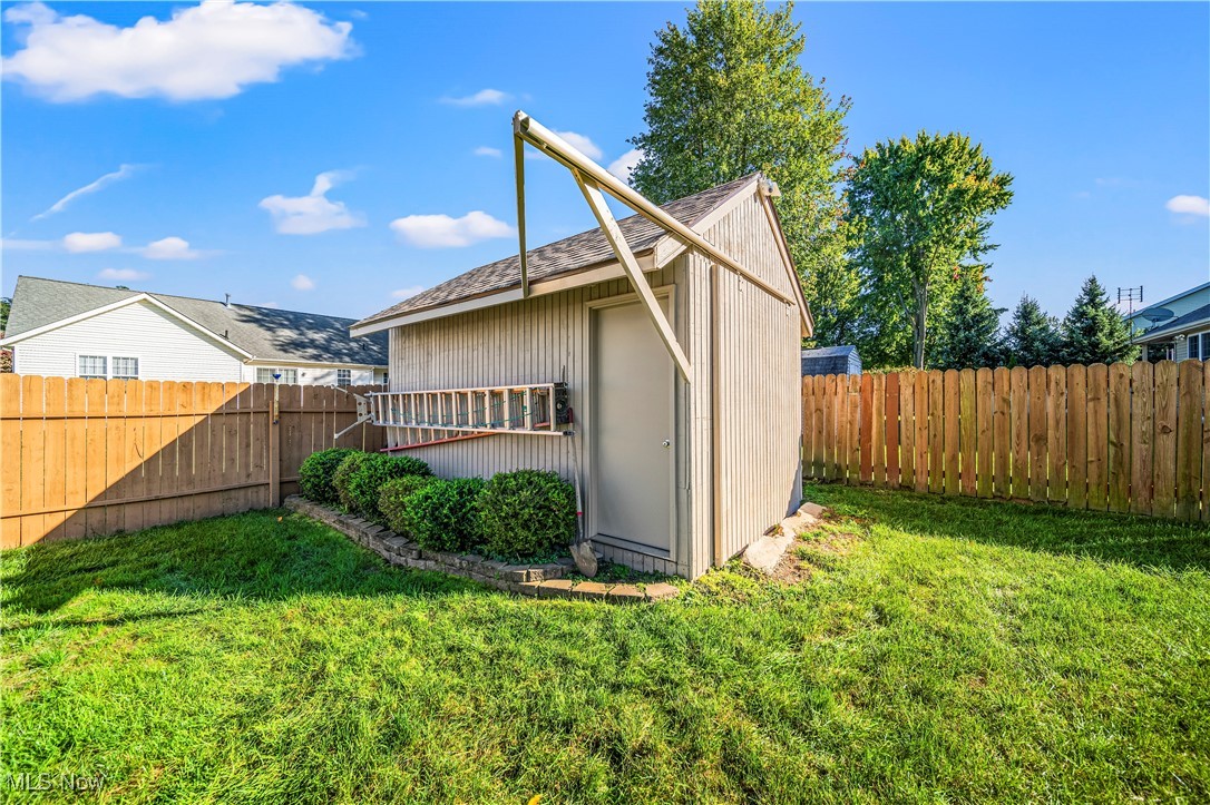 1951 Haines Road Madison, OH 44057 - Photo 40 of 44 View of outbuilding featuring a lawn