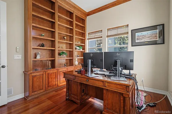 a workspace with furniture and a window
