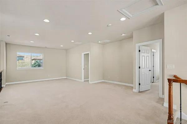 a bedroom with a bed and dresser