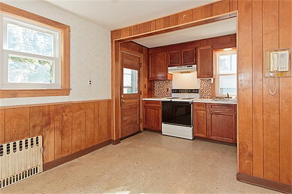 60 Robbins Road Arlington, MA 02476 - Photo 11 of 22 a kitchen with stainless steel appliances granite countertop a stove a sink and a refrigerator