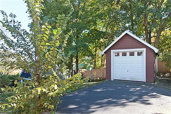60 Robbins Road Arlington, MA 02476 - Photo 3 of 22 a view of a house with a small yard