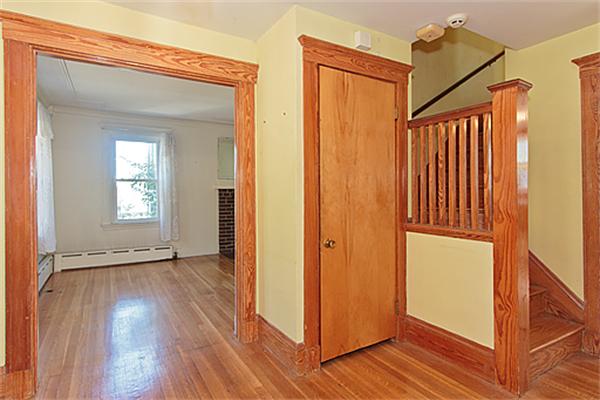 60 Robbins Road Arlington, MA 02476 - Photo 8 of 22 an empty room with wooden floor and a window
