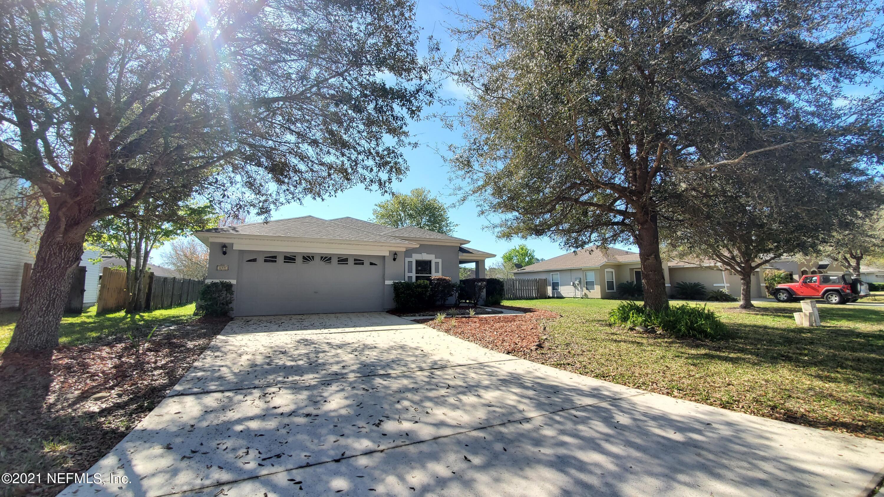 658 MacKenzie Circle St. Augustine, FL 32092 - Photo 1 of 13 a view of a house with a yard