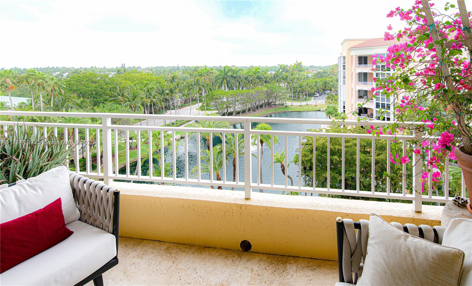 765 Crandon Boulevard, Unit 510 Key Biscayne, FL 33149 - Photo 17 of 28 a balcony with tall trees