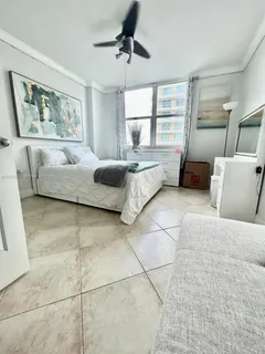 a living room with furniture and window