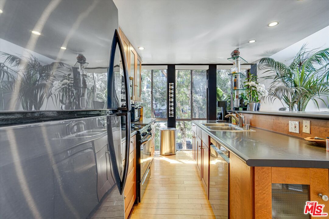 14 Mast Street Marina del Rey, CA 90292 - Photo 11 of 56 a view of a living room and floor to ceiling window or kitchen