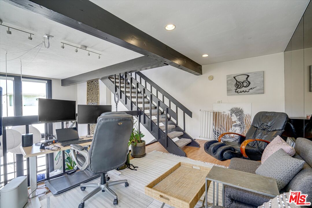 14 Mast Street Marina del Rey, CA 90292 - Photo 16 of 56 a work room with furniture and a wooden floor