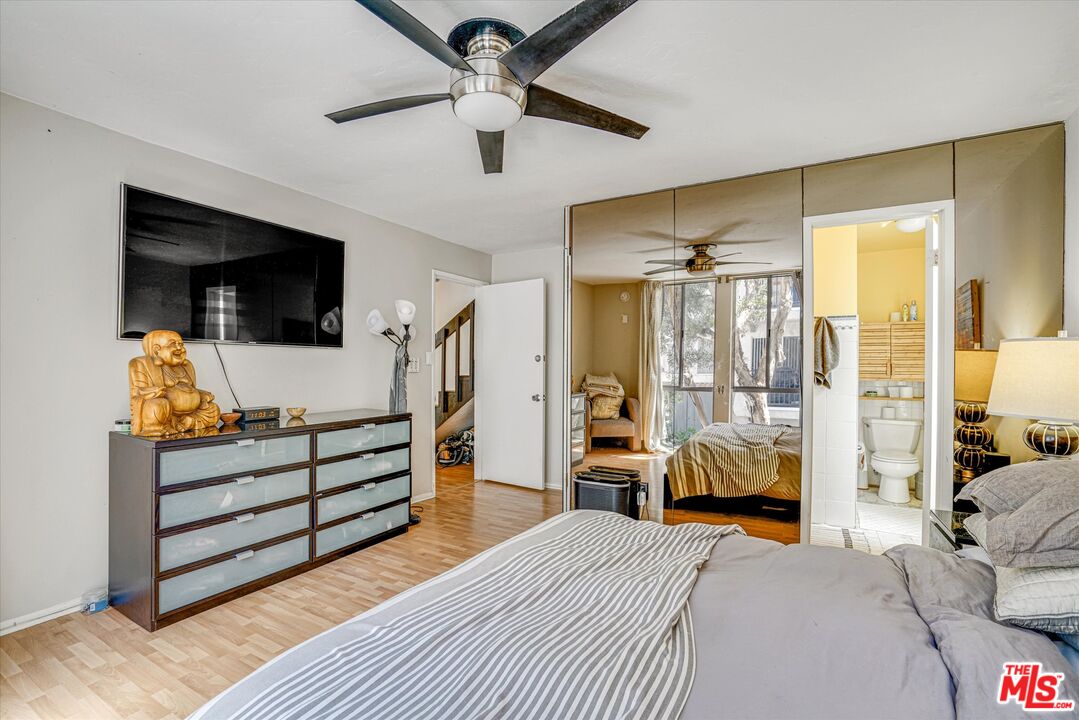 14 Mast Street Marina del Rey, CA 90292 - Photo 23 of 56 a bedroom with furniture and a flat screen tv