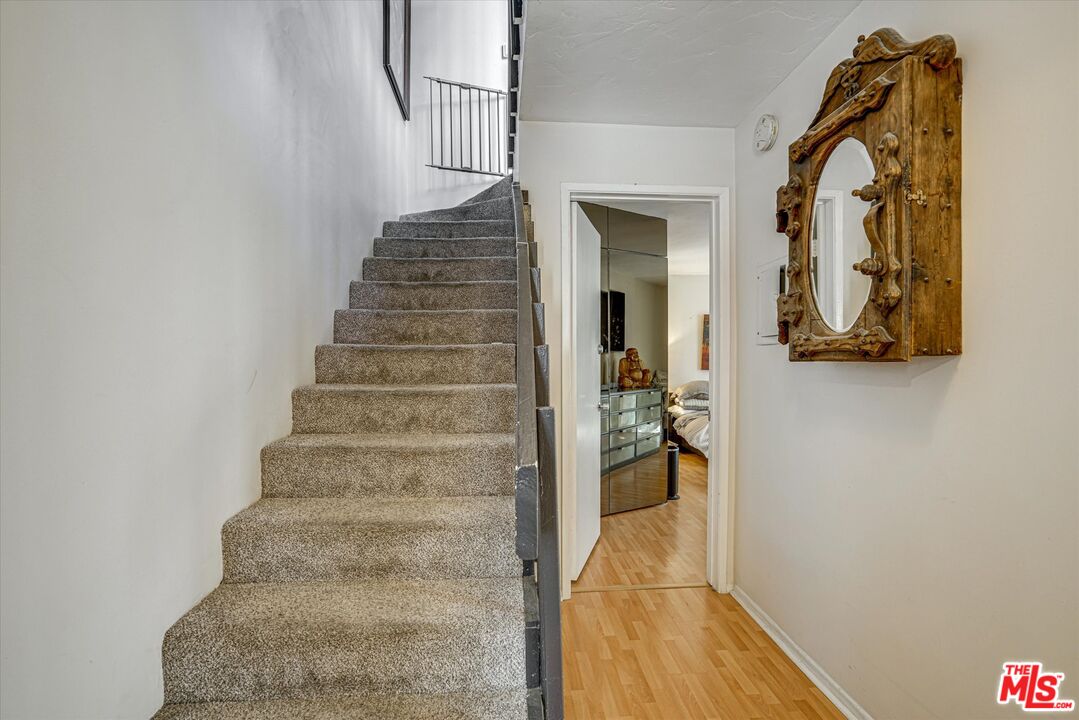 14 Mast Street Marina del Rey, CA 90292 - Photo 24 of 56 a view of a hallway with wooden floor and staircase