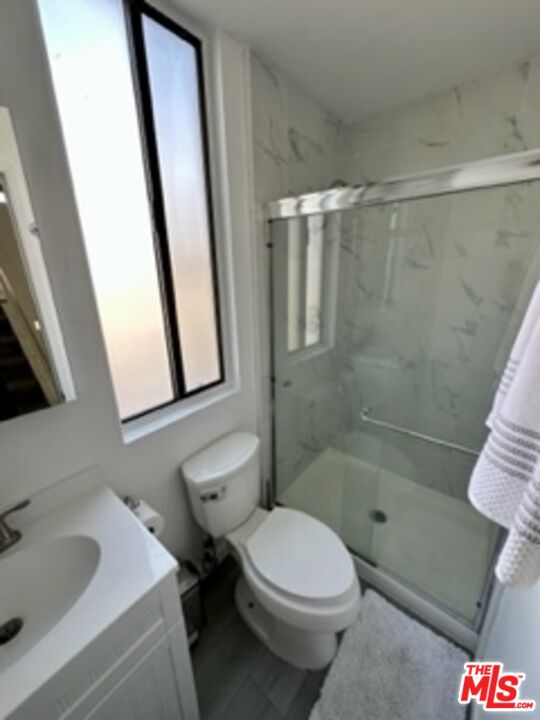 14 Mast Street Marina del Rey, CA 90292 - Photo 40 of 56 a bathroom with a sink toilet and shower