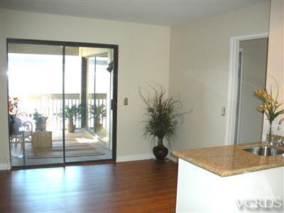 3058 Sunset Lane Oxnard, CA 93035 - Photo 4 of 10 a view of kitchen with granite countertop window and a potted plant