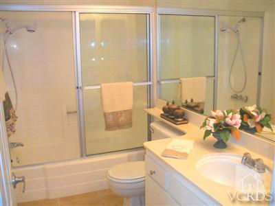 3058 Sunset Lane Oxnard, CA 93035 - Photo 8 of 10 a bathroom with a sink toilet and shower