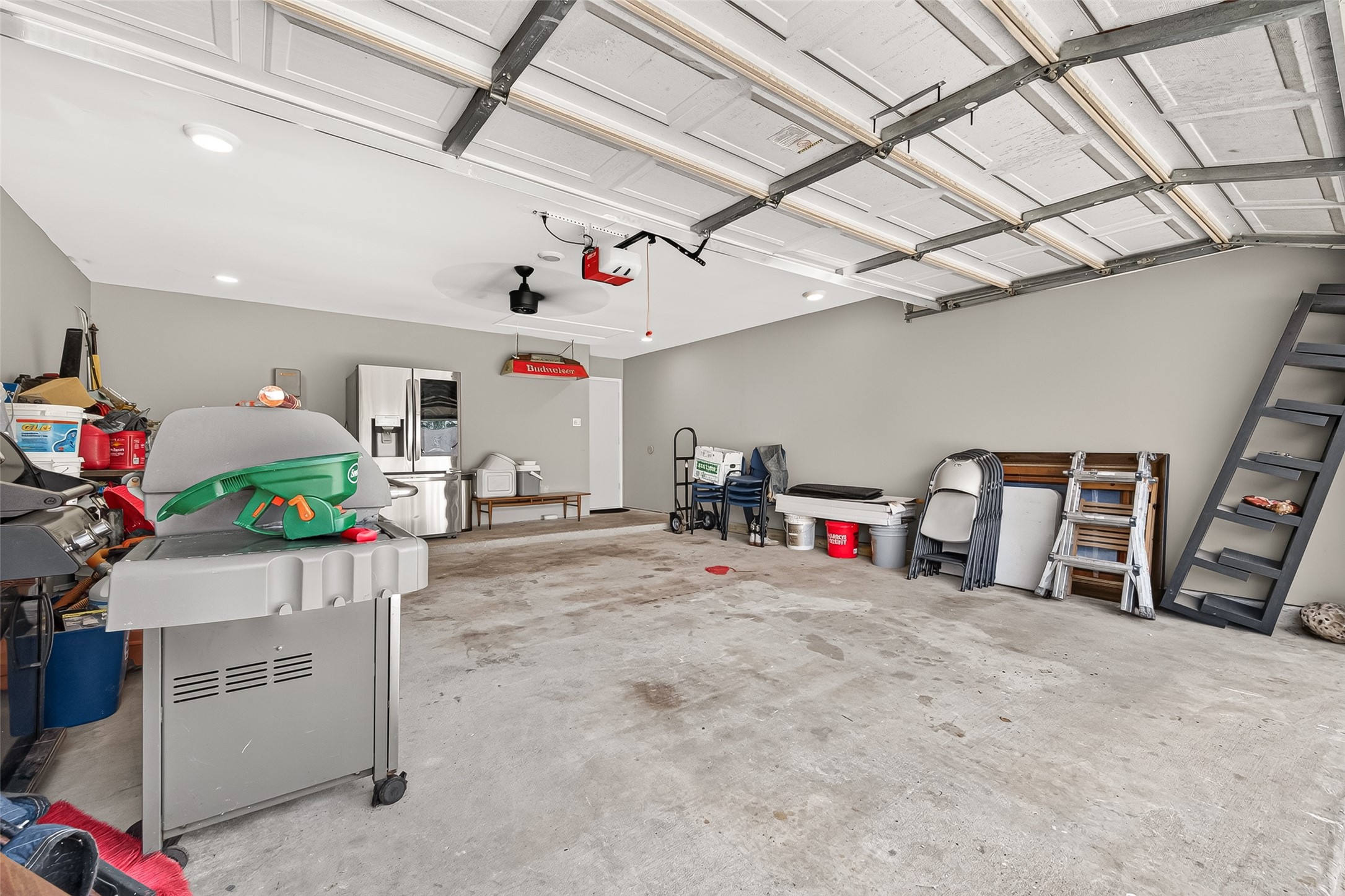 8815 Driftstone Drive Spring, TX 77379 - Photo 42 of 42 Garage has been refinished and painted, recess lighting, fan, new Garage Opener