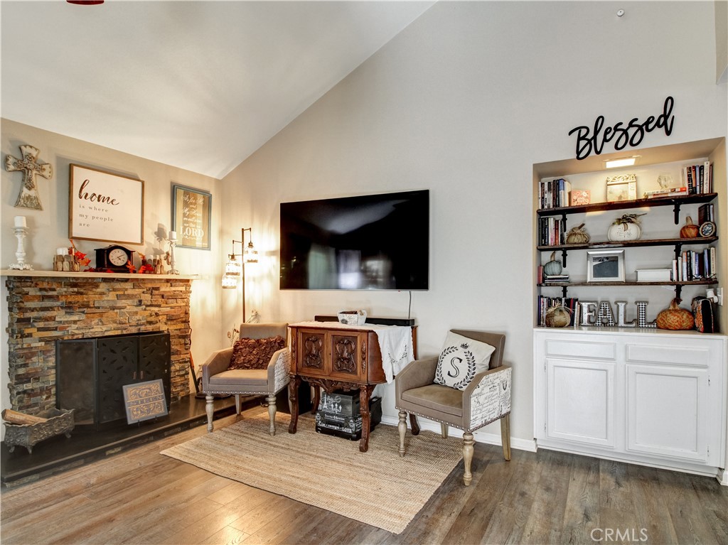 1669 Erin Avenue Upland, CA 91784 - Photo 6 of 27 a living room with furniture and a flat screen tv