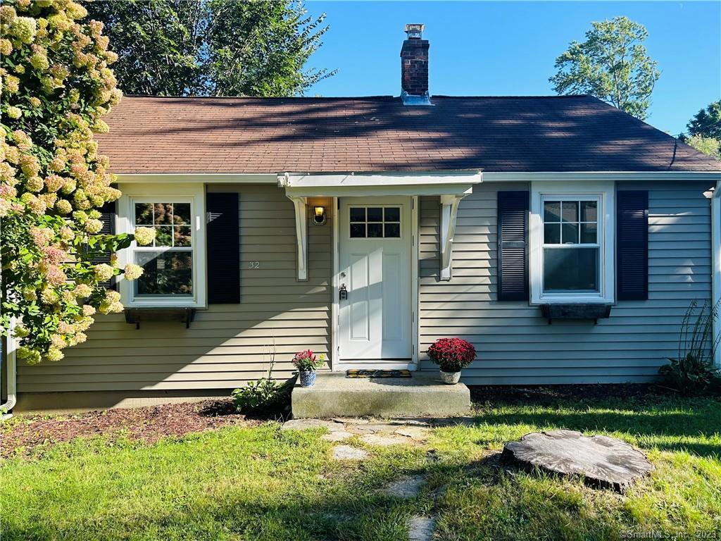 a front view of house with yard