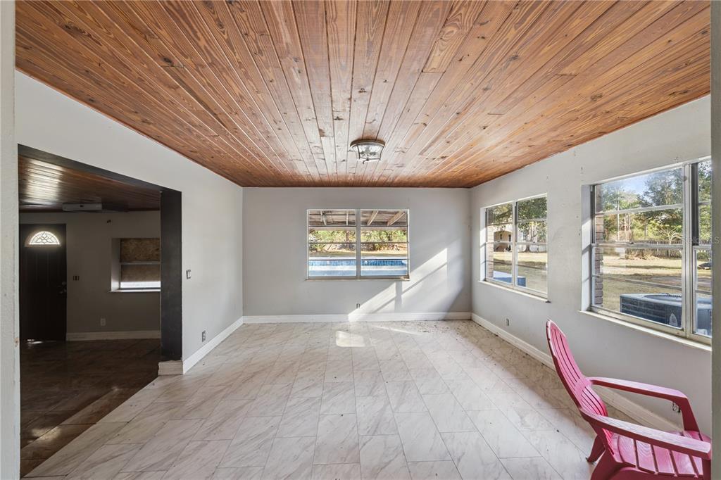 434 Diamond Acres Road Davenport, FL 33837 - Photo 15 of 20 a view of livingroom with hardwood and furniture