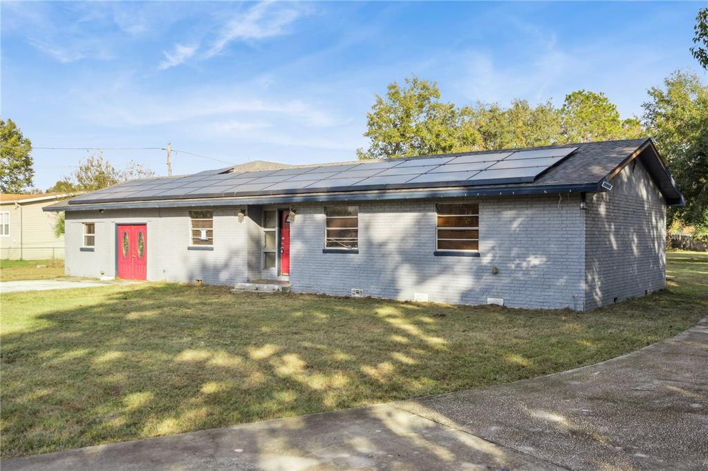 434 Diamond Acres Road Davenport, FL 33837 - Photo 3 of 20 a view of a house with a outdoor space