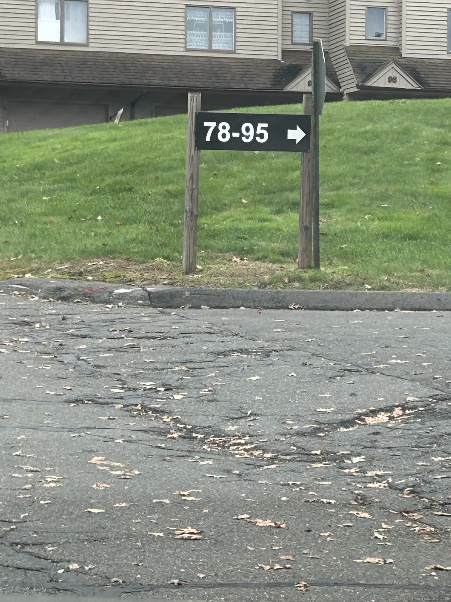 489 Wolcott Street, Unit 85 Bristol, CT 06010 - Photo 16 of 17 a view of a street sign