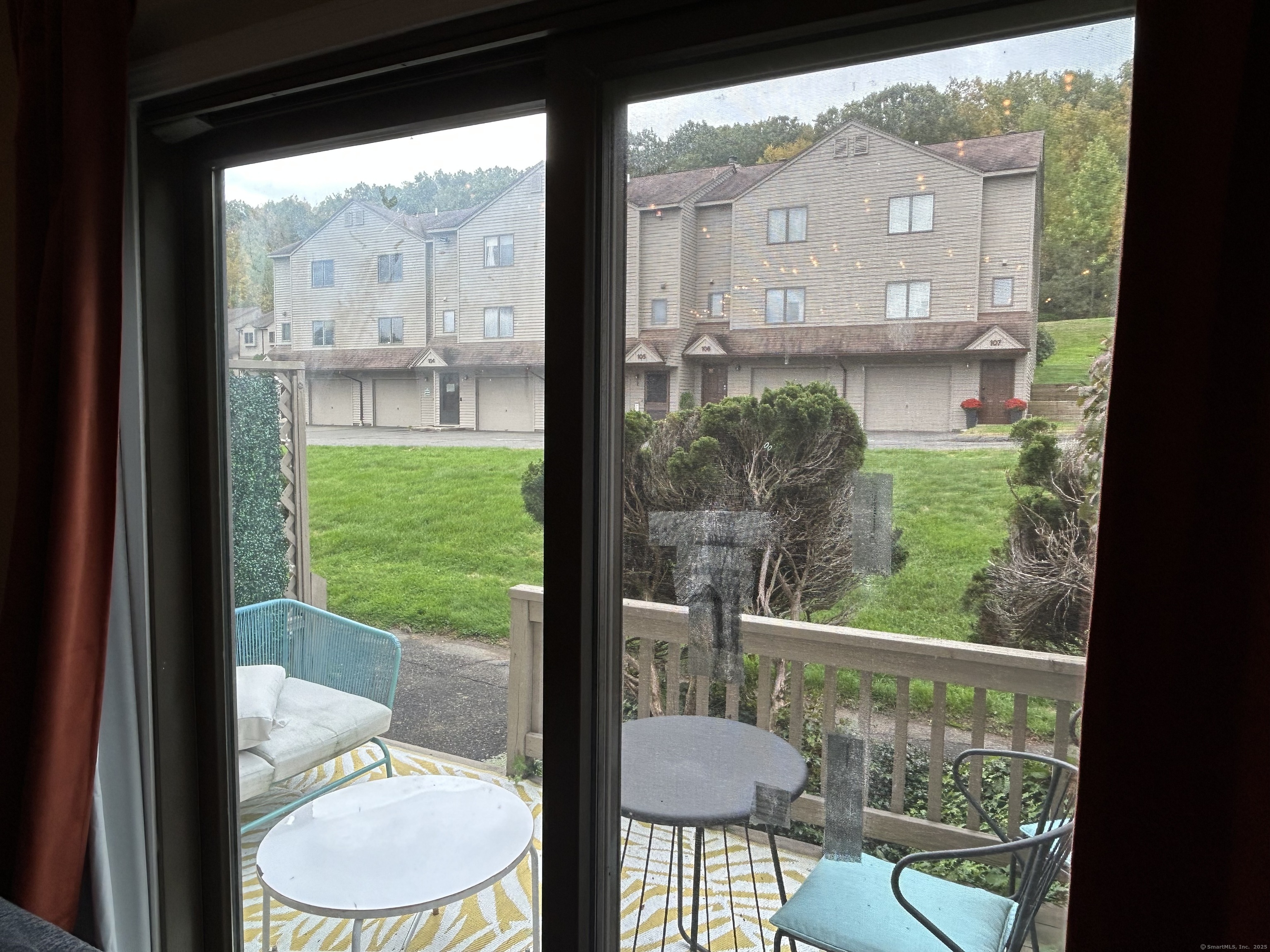 489 Wolcott Street, Unit 85 Bristol, CT 06010 - Photo 8 of 17 a view of a room with a furniture in balcony