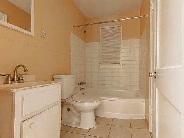 2061 Pendleton Street Memphis, TN 38114 - Photo 6 of 9 a bathroom with a sink toilet and shower