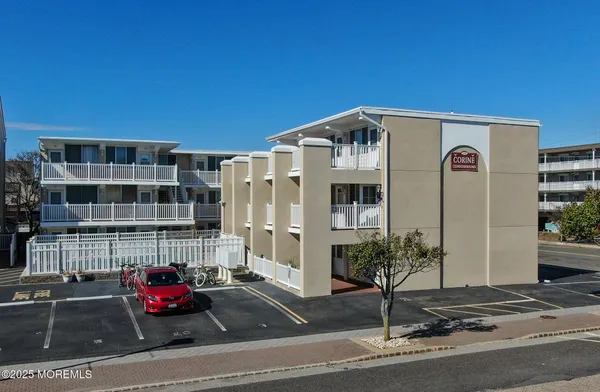 a front view of a building with street view