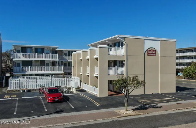 a front view of a building with street view