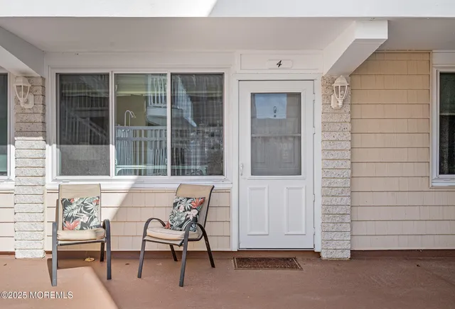 a front view of a building with a road