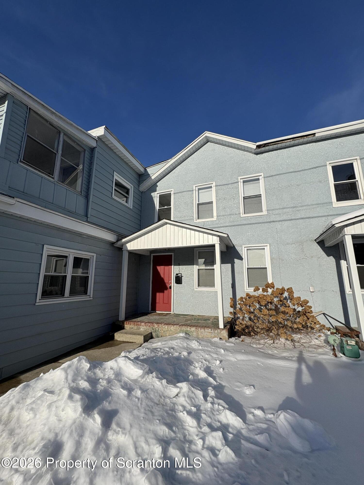 513 Oak Street Old Forge, PA 18518 - Photo 14 of 14 a front view of a house with a large window