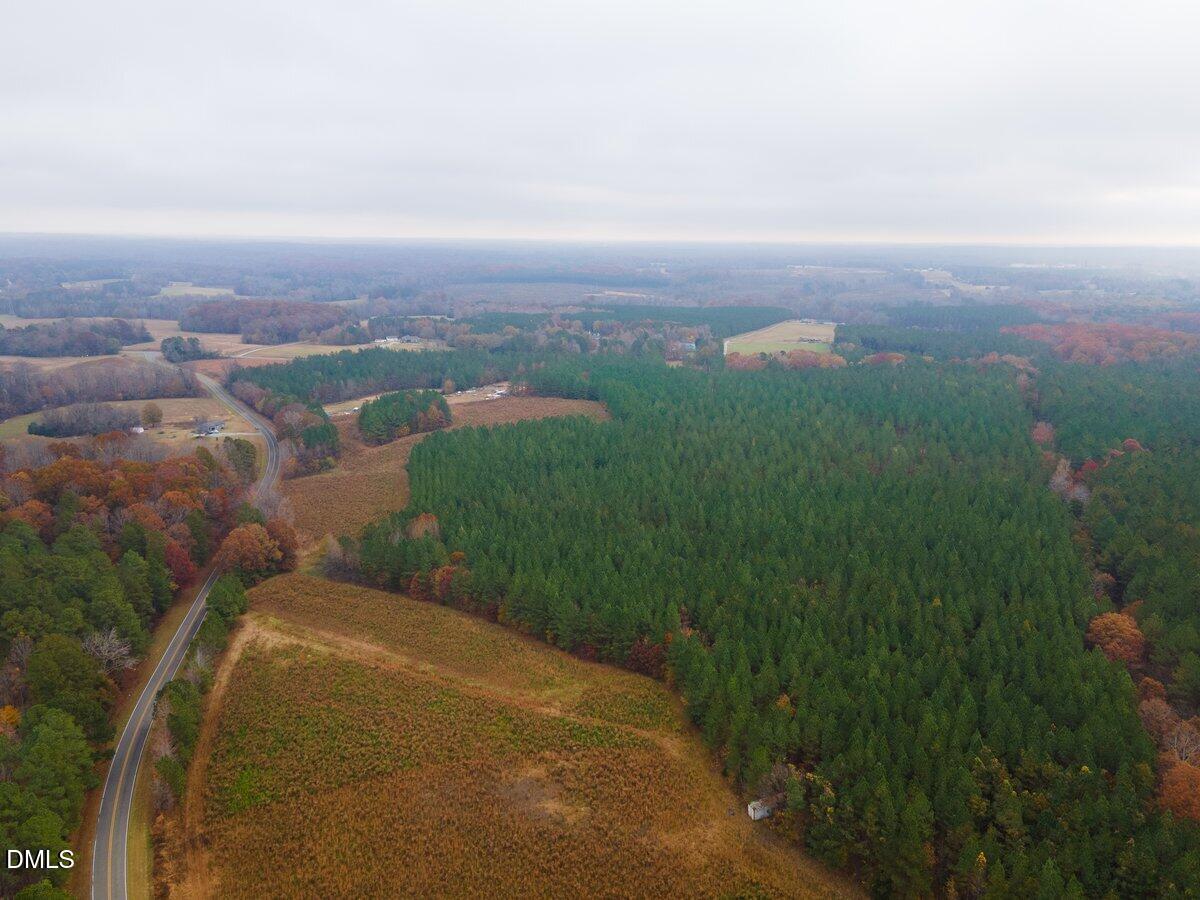 5 Old Allensville Road Roxboro, NC 27574 - Photo 4 of 6 an aerial view of a house with yard