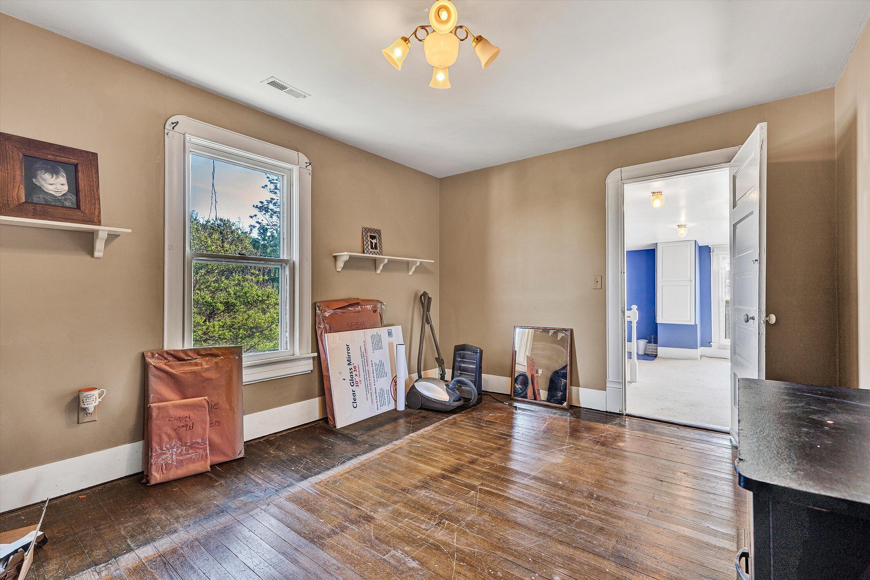 624 South Maple Street Vinton, VA 24179 - Photo 24 of 40 a living room with furniture and wooden floor