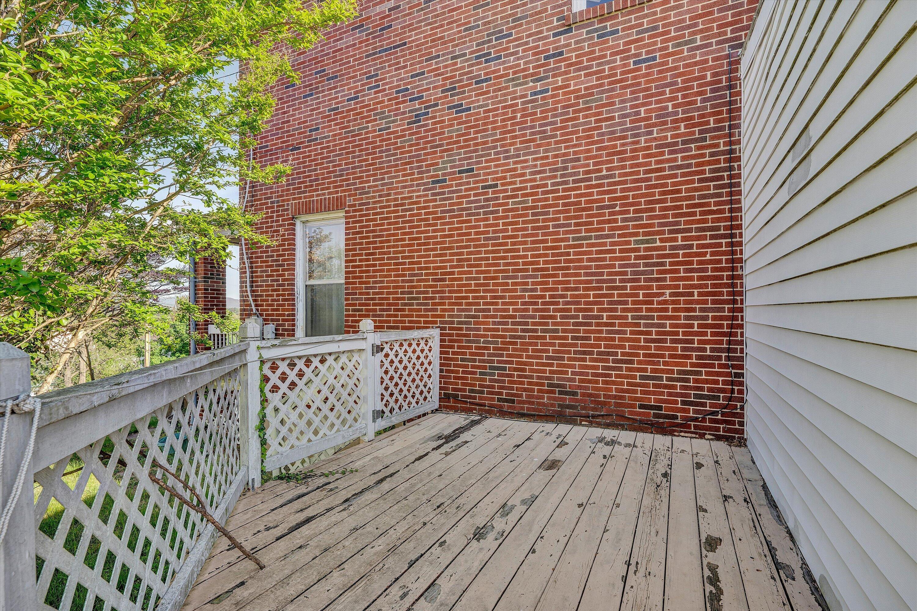 624 South Maple Street Vinton, VA 24179 - Photo 31 of 40 a view of wooden deck