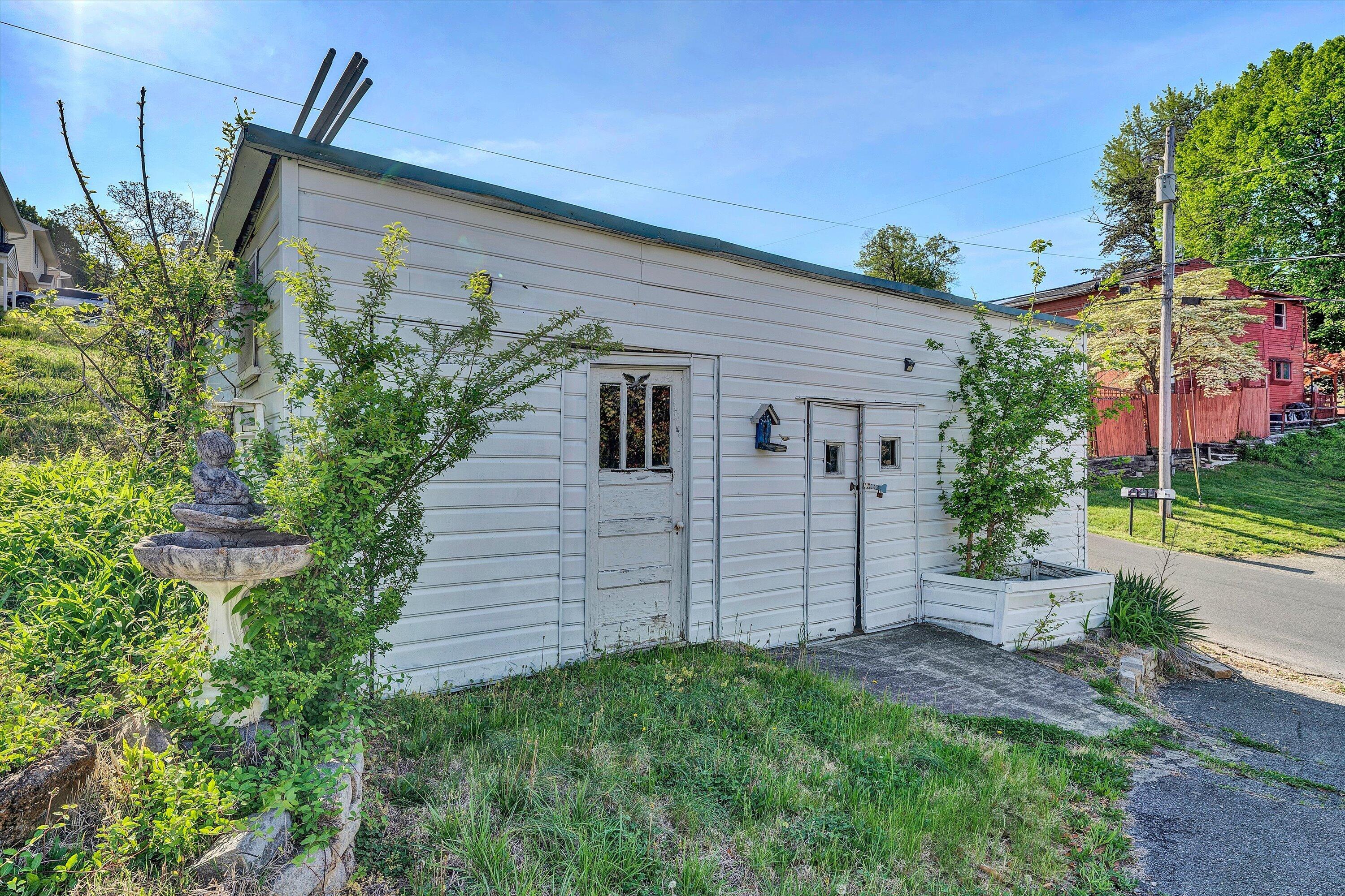 624 South Maple Street Vinton, VA 24179 - Photo 35 of 40 a view of a house with a yard