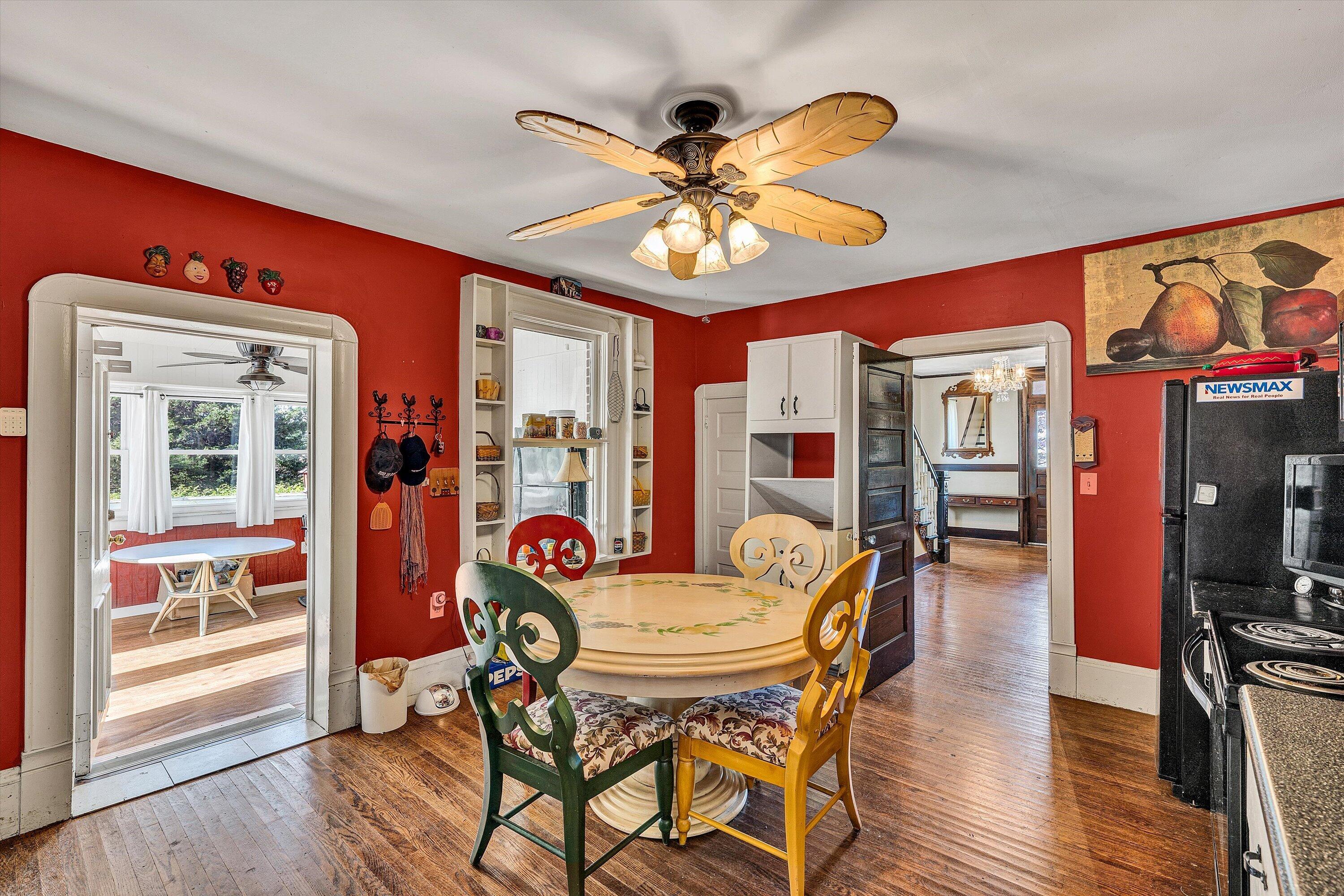 624 South Maple Street Vinton, VA 24179 - Photo 10 of 40 a view of a dining room with furniture wooden floor and chandelier