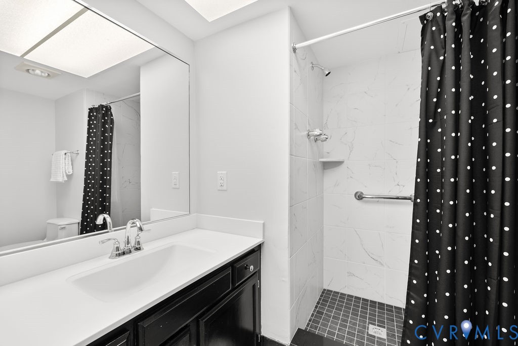 2956 Hathaway Road, Unit U704 Richmond, VA 23225 - Photo 22 of 42 Bathroom featuring a vanity with an integrated sin