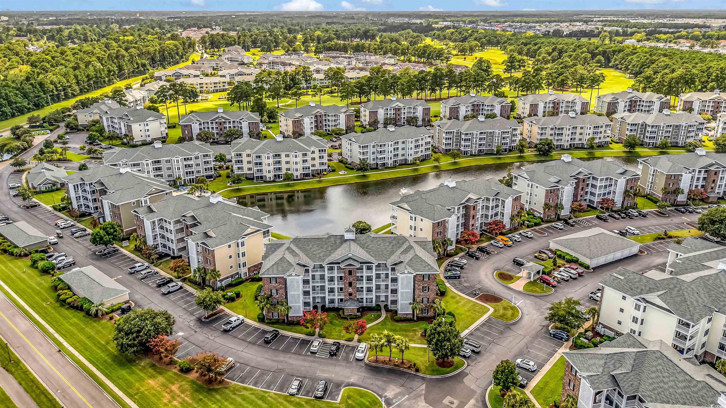 4829 Luster Leaf Circle, Unit 301 Myrtle Beach, SC 29577 - Photo 2 of 34 Drone / aerial view of a large body of water