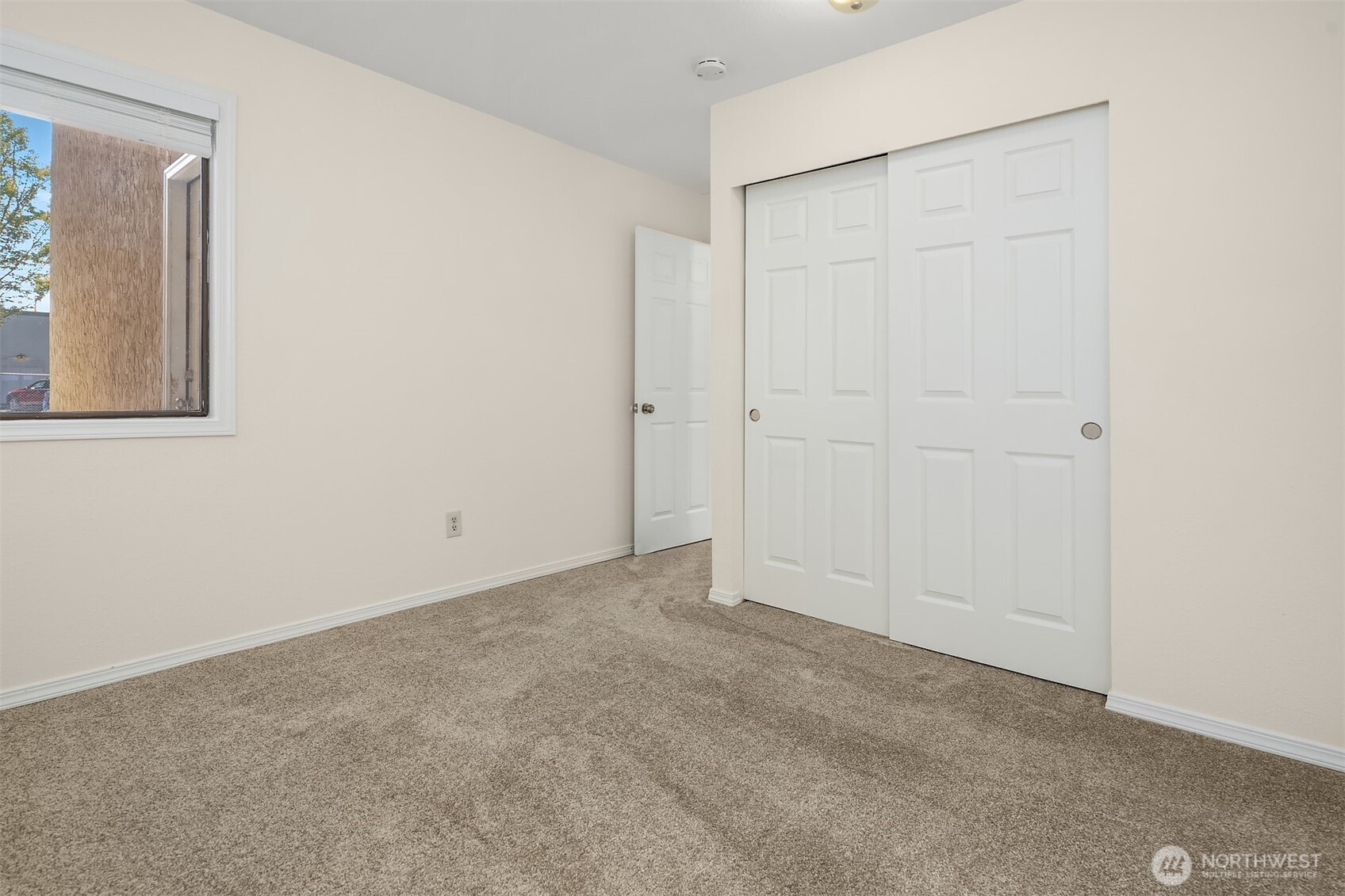 12424 Northeast 145th Street, Unit C25 Kirkland, WA 98034 - Photo 27 of 40 a view of an empty room