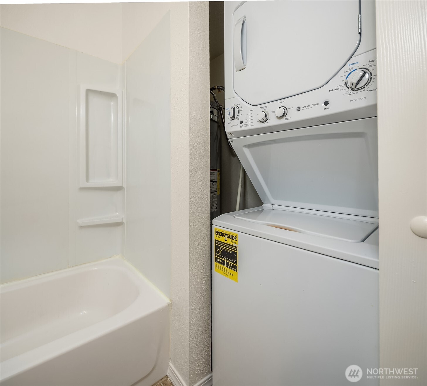 12424 Northeast 145th Street, Unit C25 Kirkland, WA 98034 - Photo 30 of 40 a utility room with dryer and washer