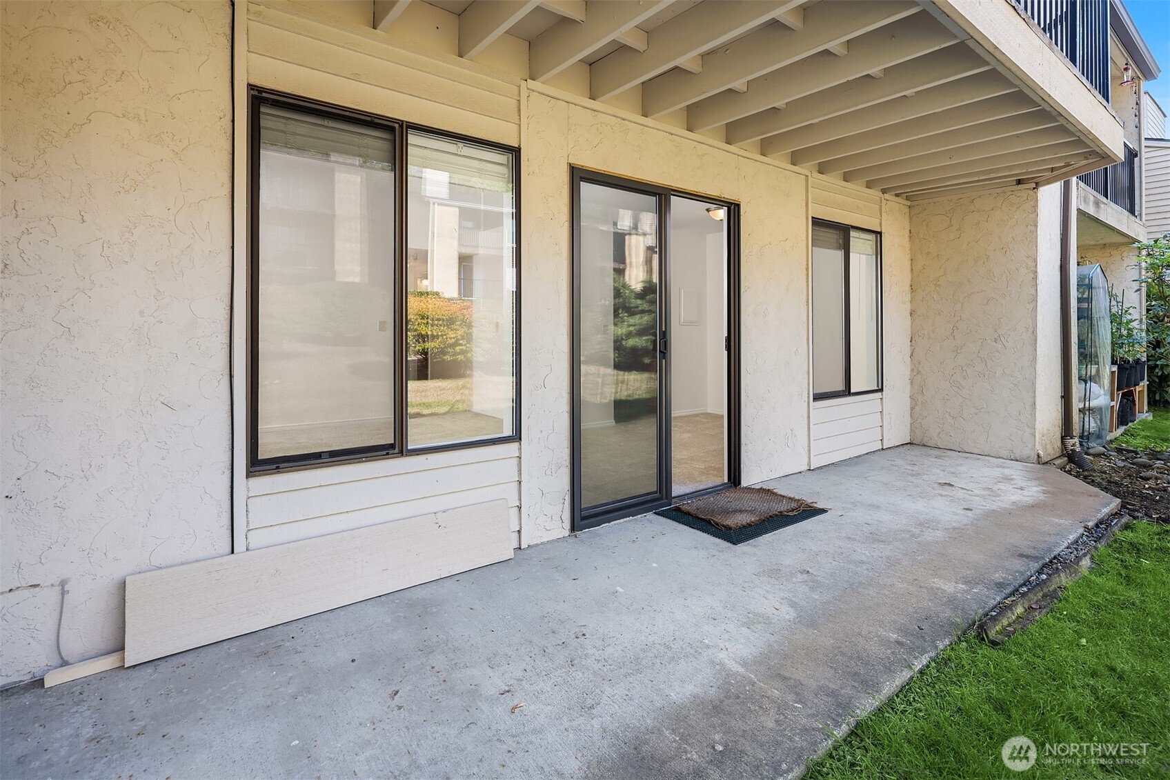 12424 Northeast 145th Street, Unit C25 Kirkland, WA 98034 - Photo 31 of 40 a view of front door with yard
