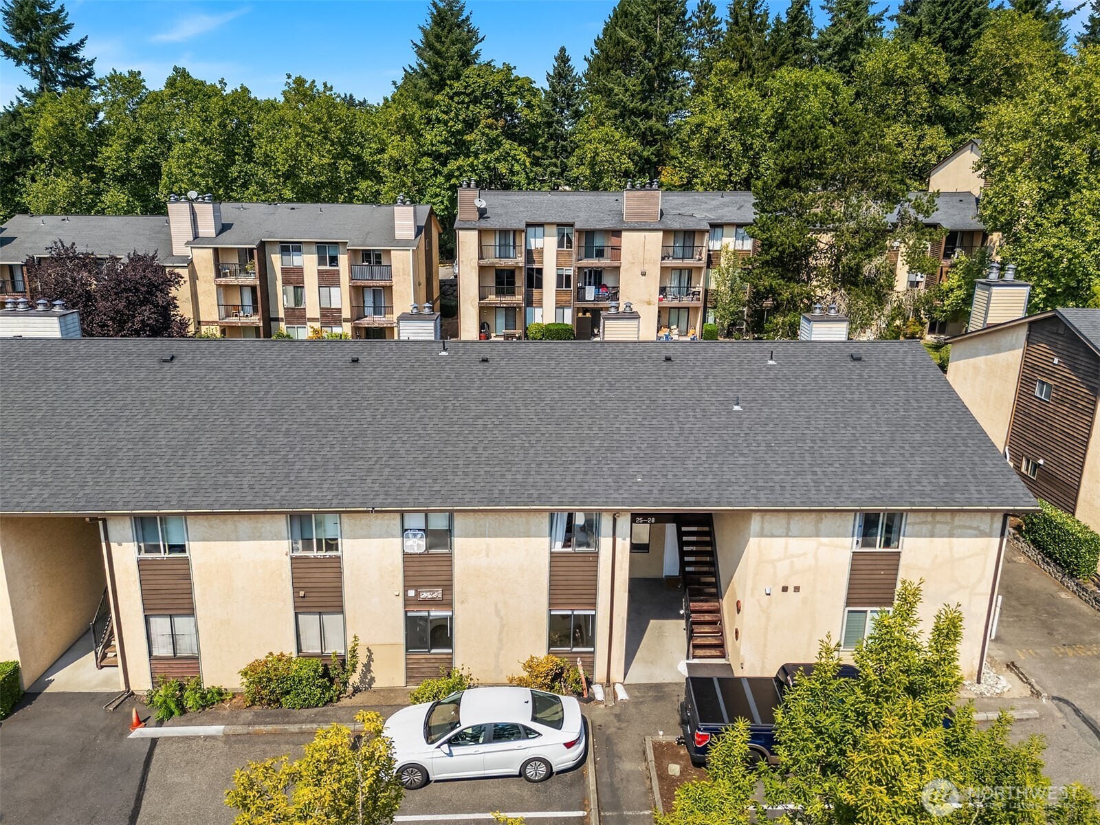12424 Northeast 145th Street, Unit C25 Kirkland, WA 98034 - Photo 35 of 40 an aerial view of residential houses and street