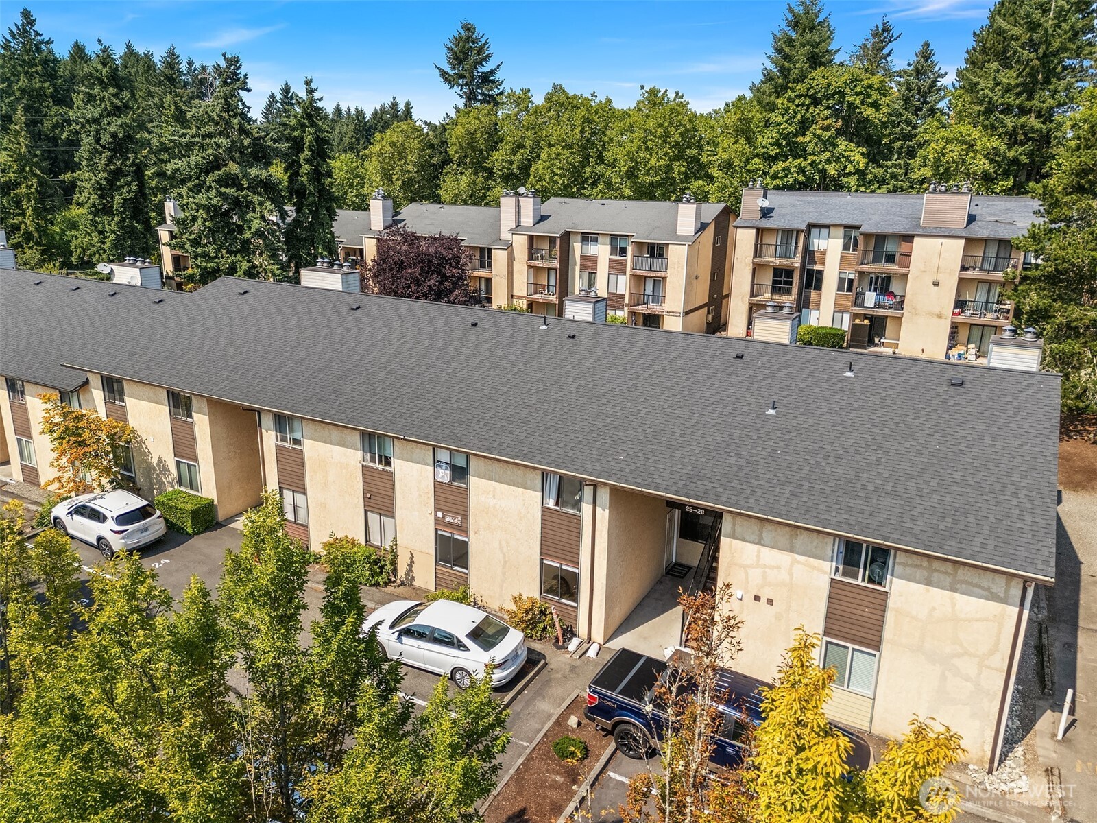 12424 Northeast 145th Street, Unit C25 Kirkland, WA 98034 - Photo 36 of 40 an aerial view of a house with a yard