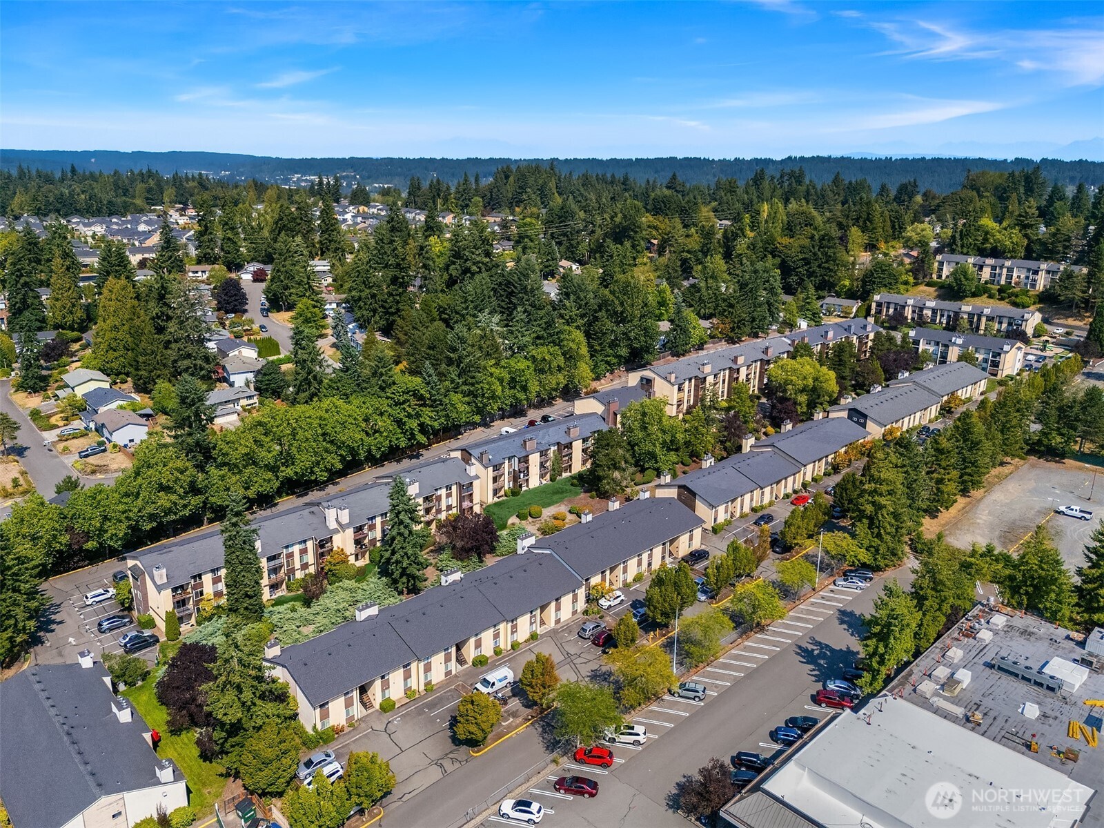 12424 Northeast 145th Street, Unit C25 Kirkland, WA 98034 - Photo 37 of 40 an aerial view of a city