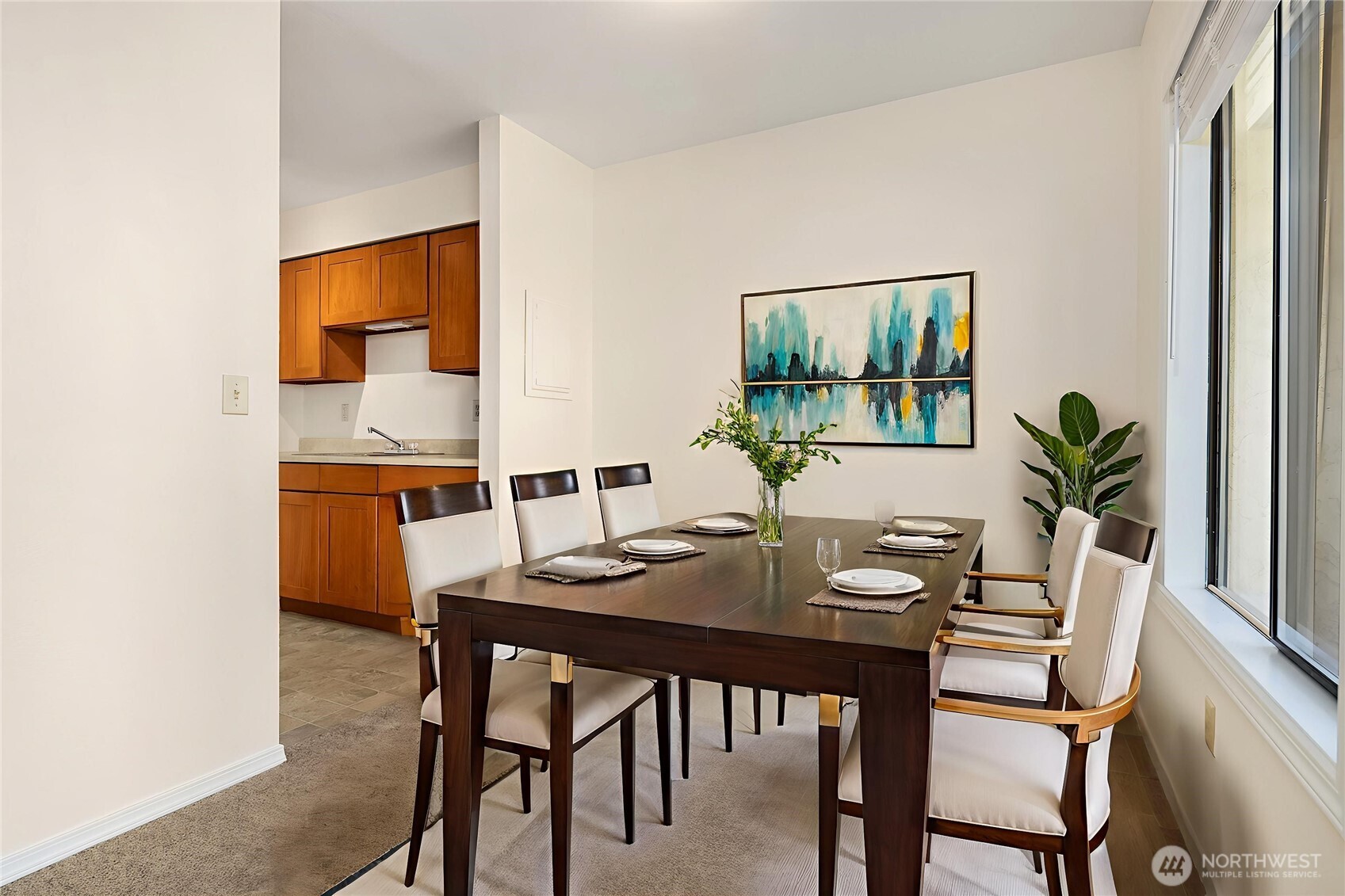 12424 Northeast 145th Street, Unit C25 Kirkland, WA 98034 - Photo 6 of 40 a view of a dining room with furniture and window